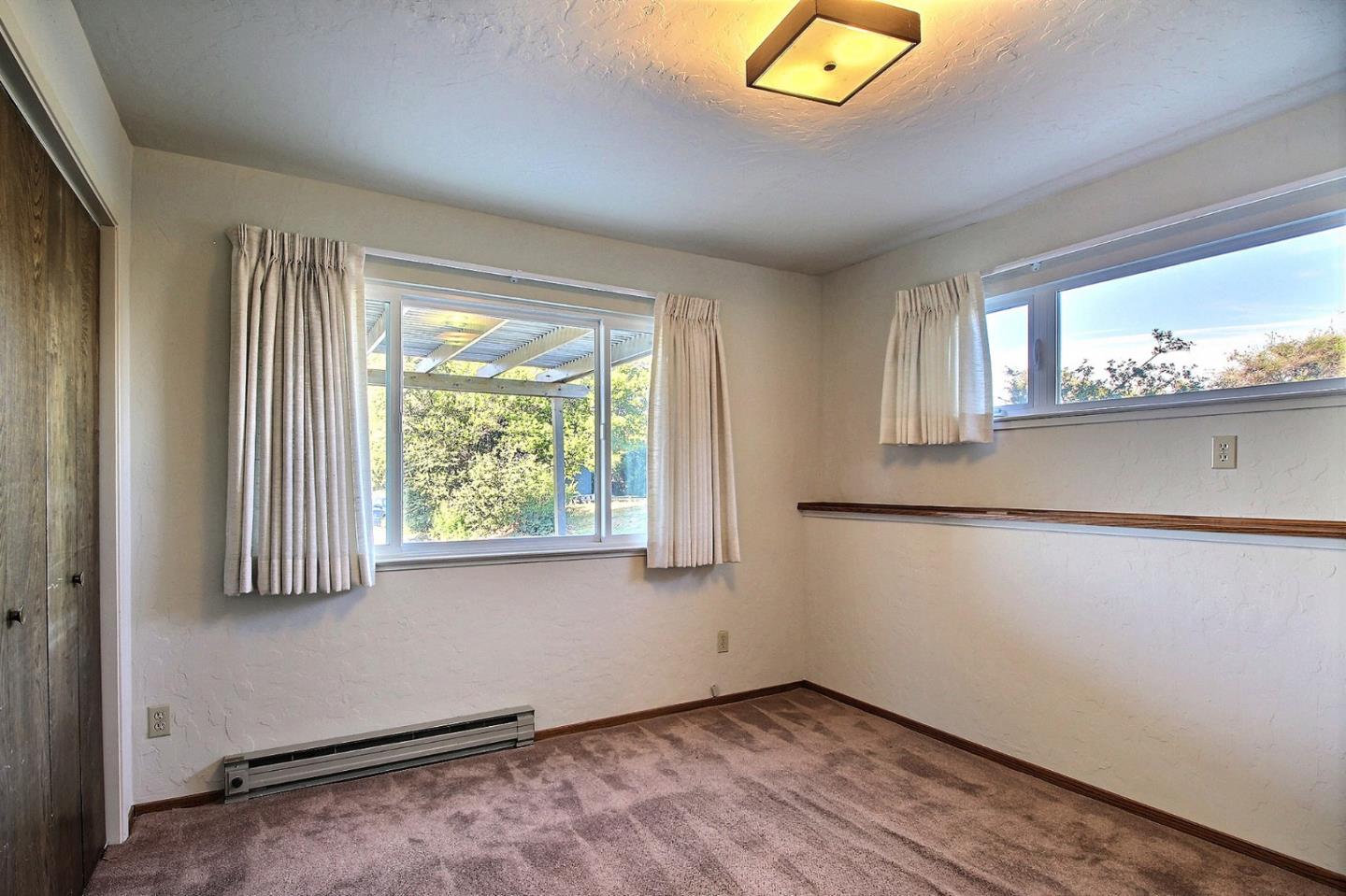 16999 McGill Road Saratoga, CA 95070 - Photo 31 of 41 a view of an empty room with a window