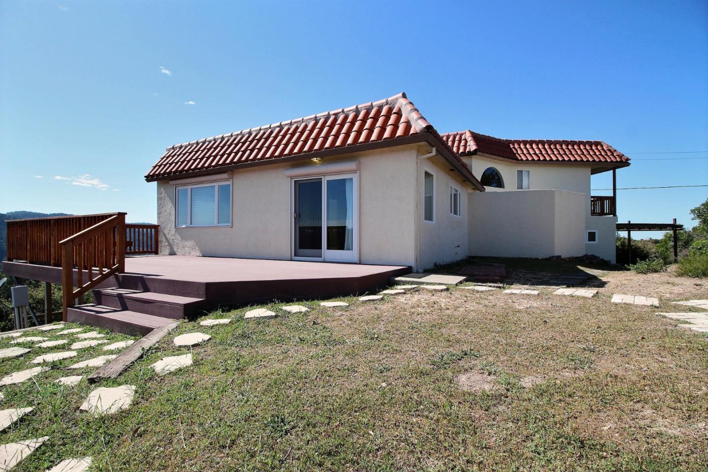 16999 McGill Road Saratoga, CA 95070 - Photo 33 of 41 a view of a house with a patio