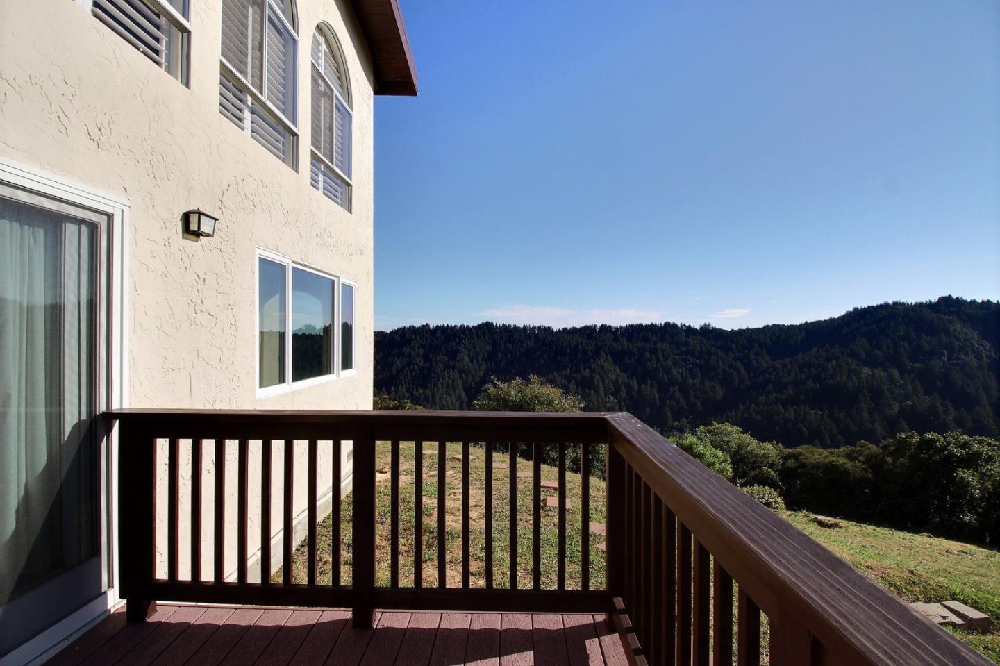 16999 McGill Road Saratoga, CA 95070 - Photo 39 of 41 a view of a balcony with a couple of flower plants