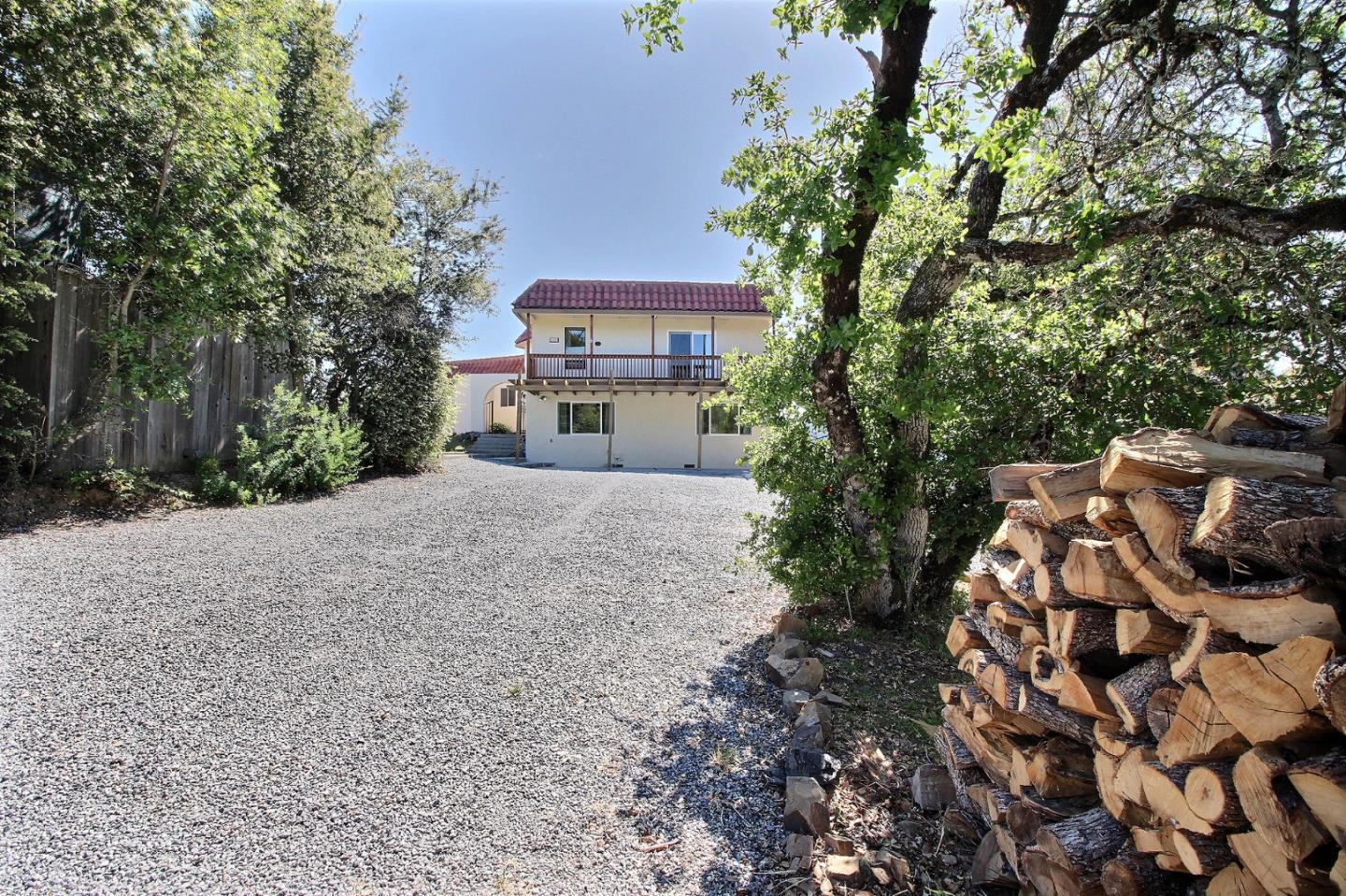16999 McGill Road Saratoga, CA 95070 - Photo 4 of 41 a view of a house with yard and sitting area