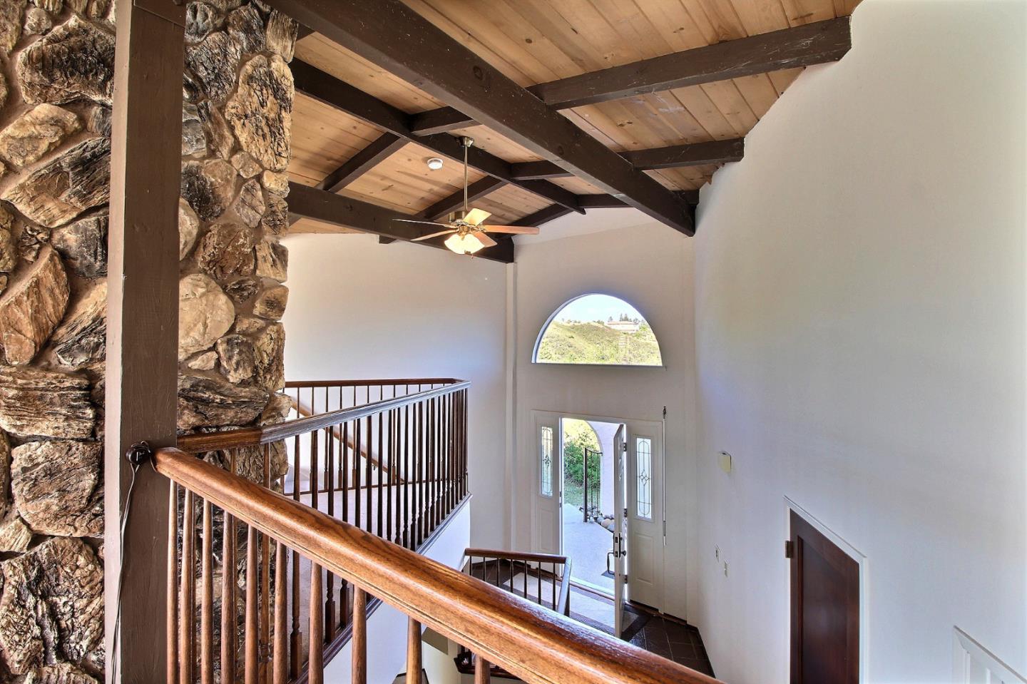 16999 McGill Road Saratoga, CA 95070 - Photo 9 of 41 a view of entryway with a window and wooden floor