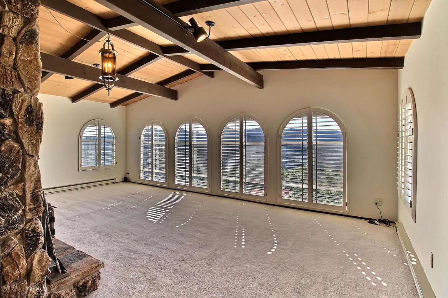 16999 McGill Road Saratoga, CA 95070 - Photo 10 of 41 a view of an empty room with windows