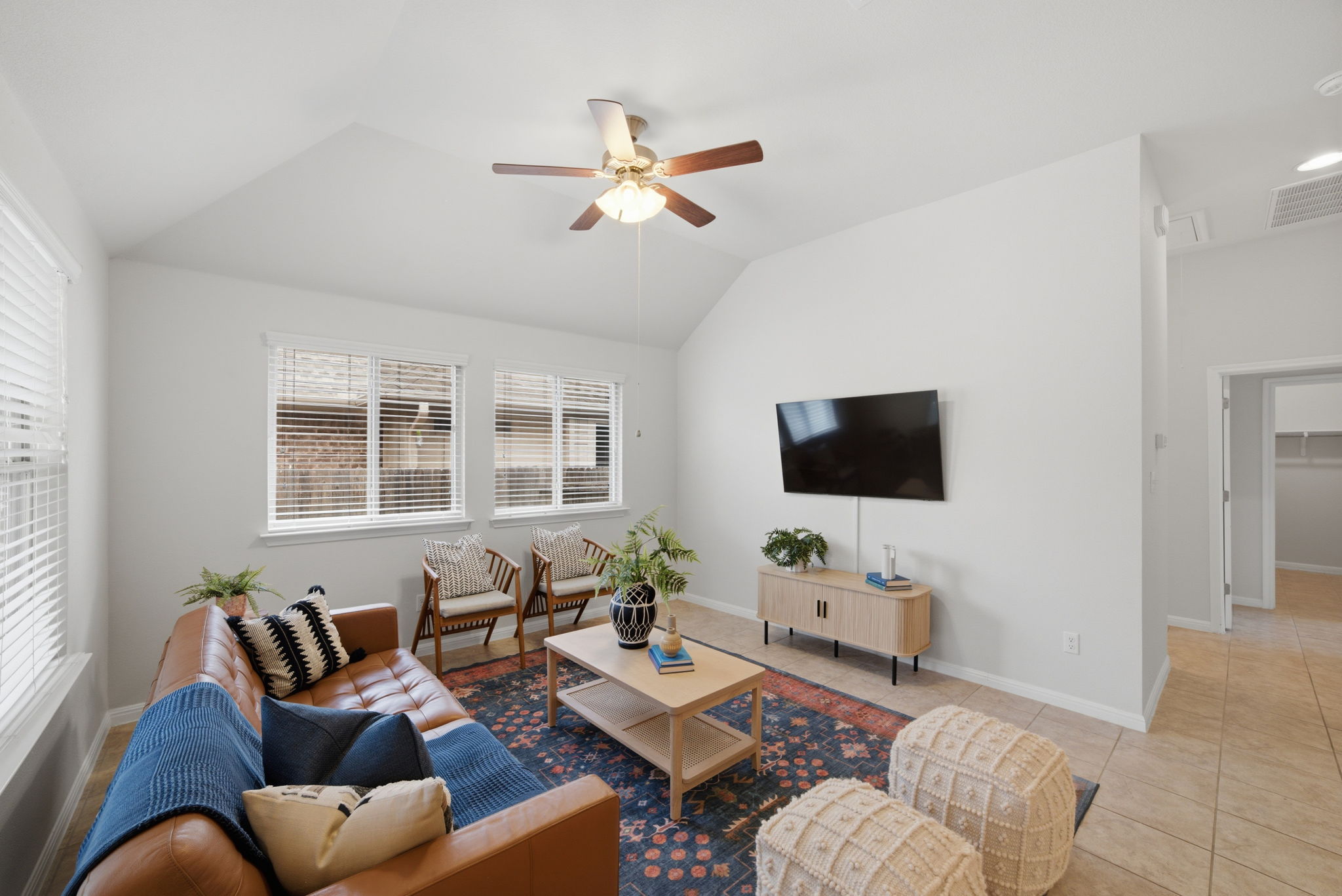 514 Nautical Loop Kyle, TX 78640 - Photo 6 of 24 A comfortable living space boasts high vaulted ceilings and abundant natural light.