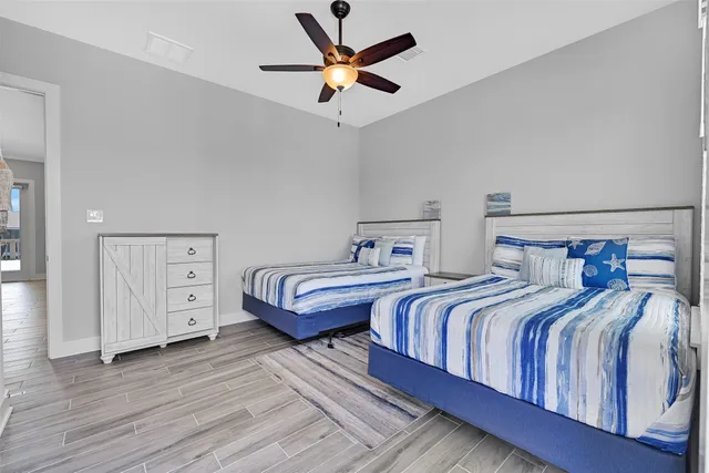 a view of a room with wooden floor and closet
