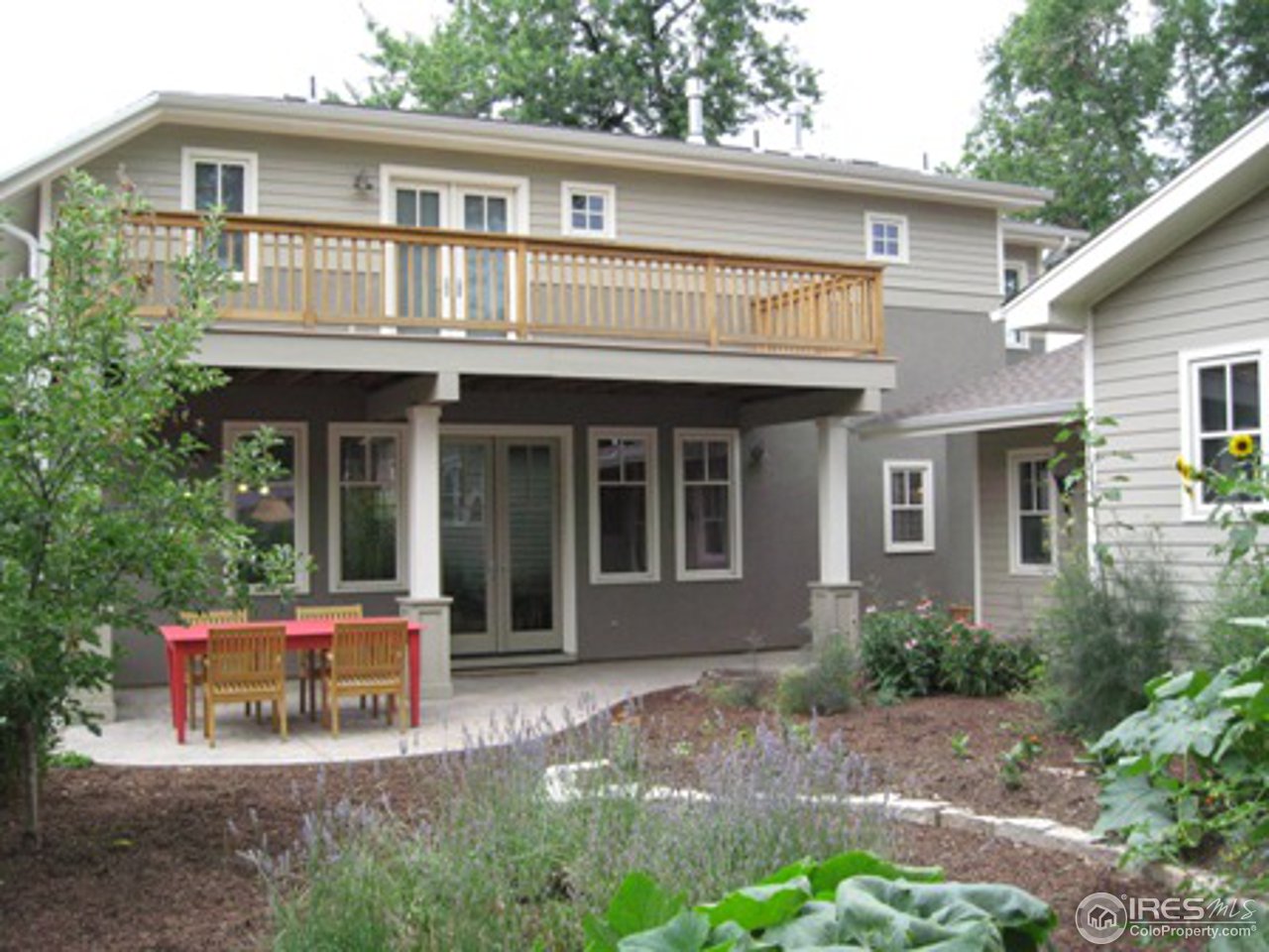 1023 Forest Avenue Boulder, CO 80304 - Photo 2 of 13 a backyard of a house with outdoor seating