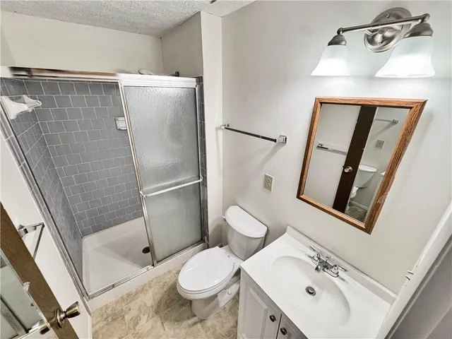 a living room with a fireplace