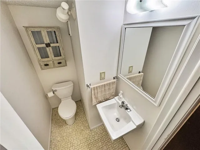 a balcony with trees in front of it