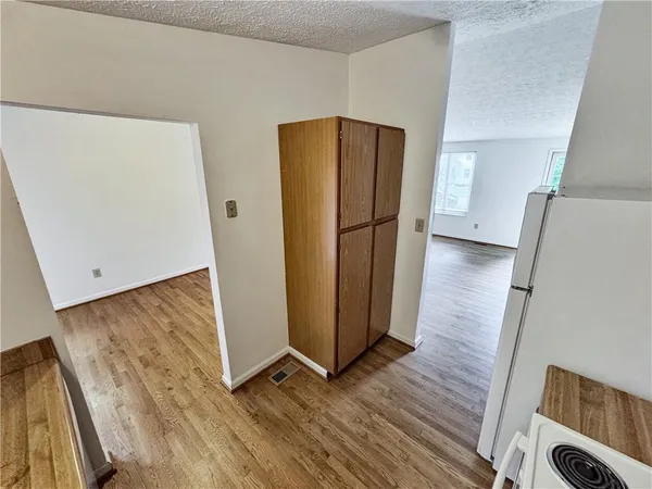 a bathroom with a toilet sink and shower