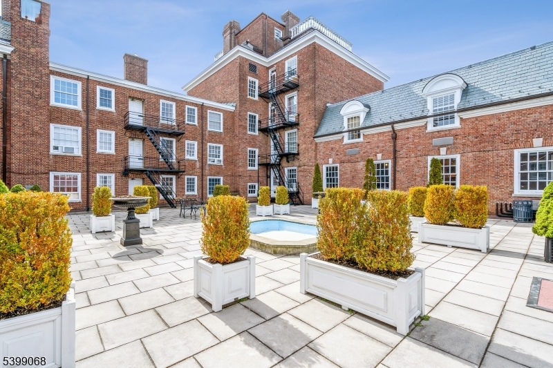 31 Palmer Square West, Unit B Princeton, NJ 08542 - Photo 7 of 13 a view of a building with many windows