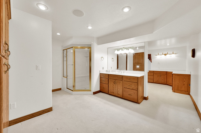 1085 Windsor Drive Provo, UT 84604 - Photo 55 of 83 Full bathroom with light carpet, a stall shower, vanity, and recessed lighting