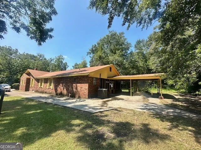 front view of a house with a yard