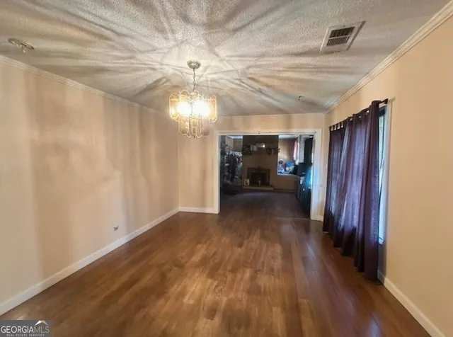 a view of a livingroom with a hardwood