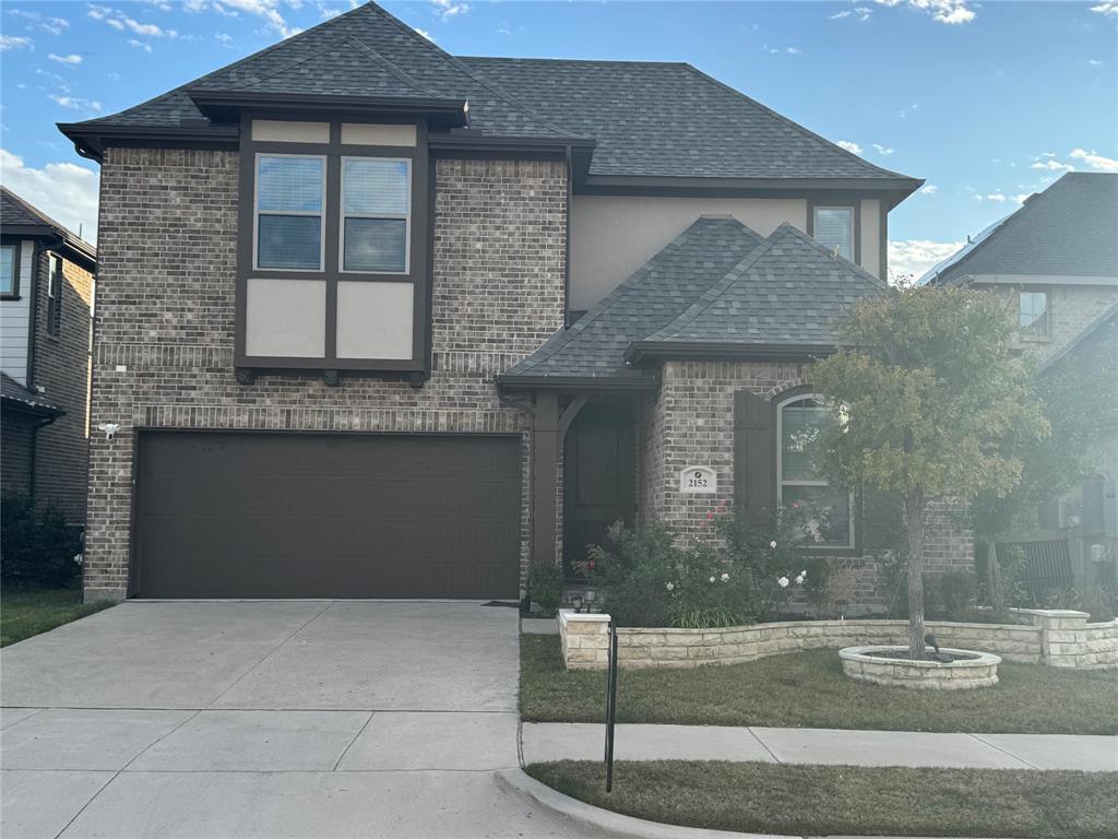 2152 Hermann Lane Carrollton, TX 75010 - Photo 1 of 18 a front view of a house