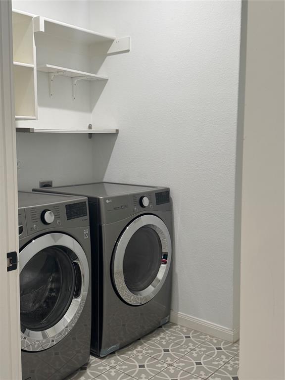 2152 Hermann Lane Carrollton, TX 75010 - Photo 12 of 18 a utility room with dryer and washer
