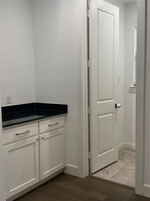 2152 Hermann Lane Carrollton, TX 75010 - Photo 13 of 18 a view of a hallway with closet