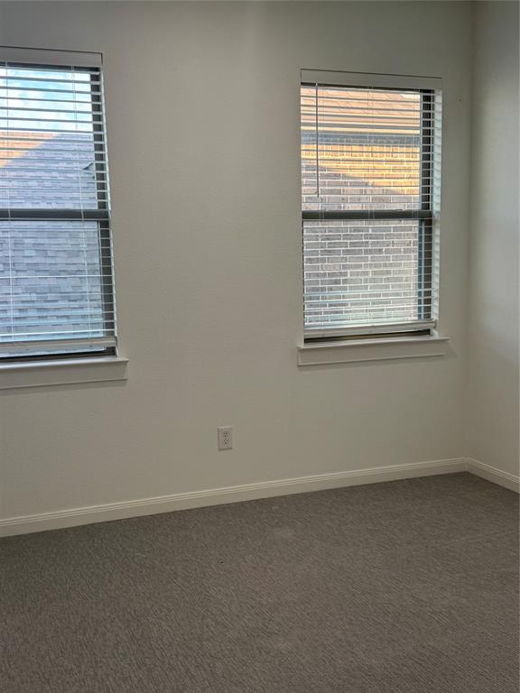 2152 Hermann Lane Carrollton, TX 75010 - Photo 2 of 18 a view of an empty room with a window