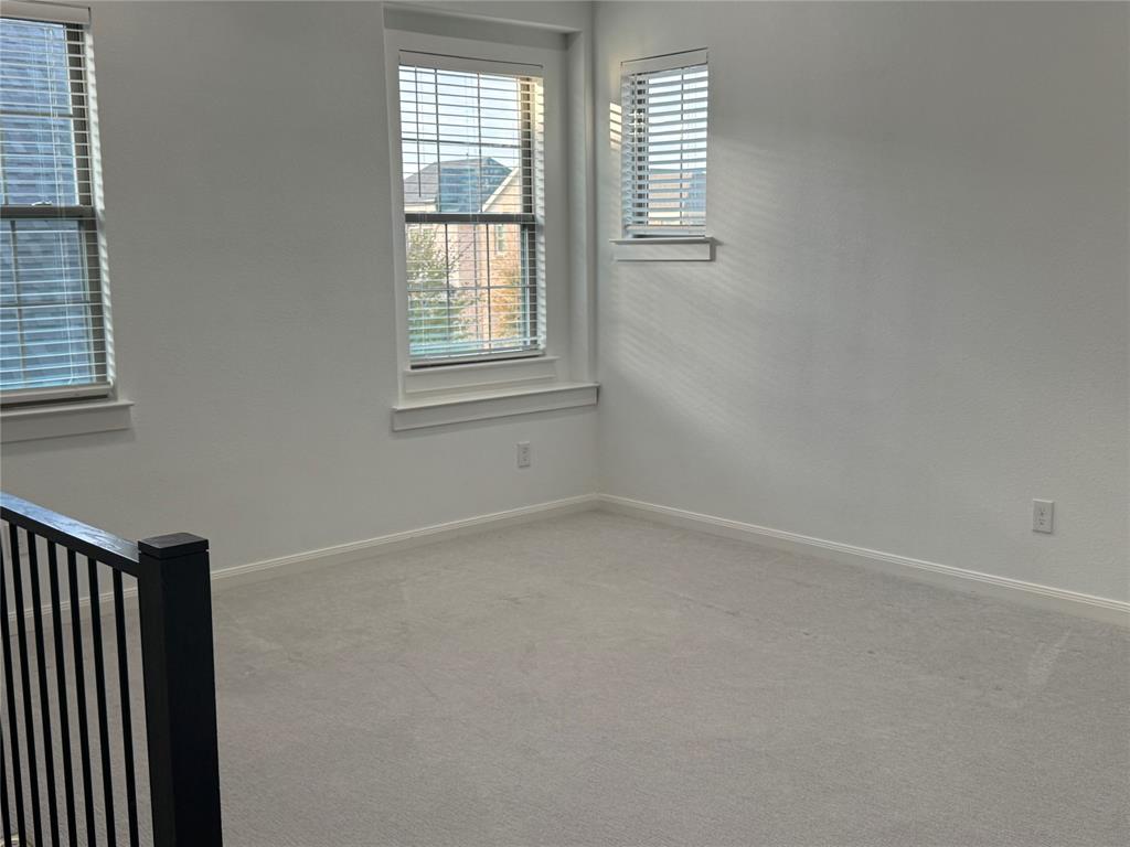 2152 Hermann Lane Carrollton, TX 75010 - Photo 3 of 18 an empty room with windows