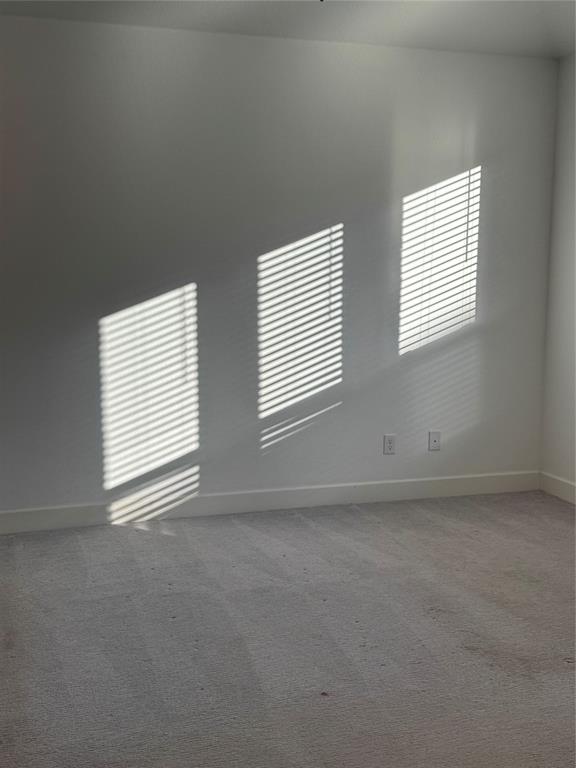 2152 Hermann Lane Carrollton, TX 75010 - Photo 8 of 18 an empty room with a window