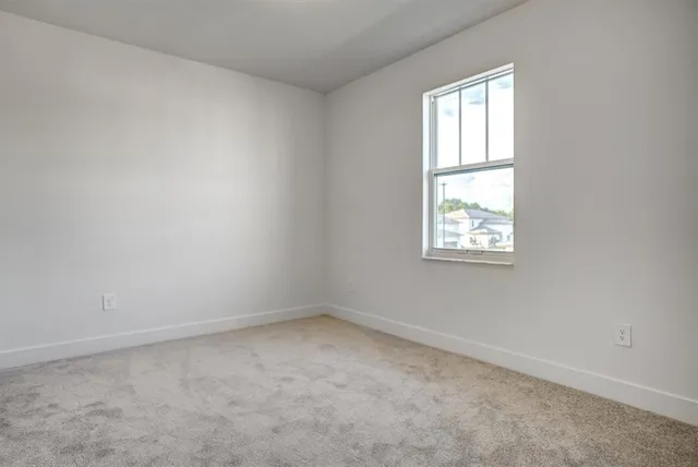 a bathroom with a double vanity sink mirror and shower