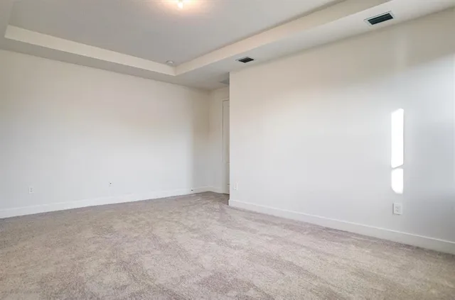 a bed room with furniture and a chandelier