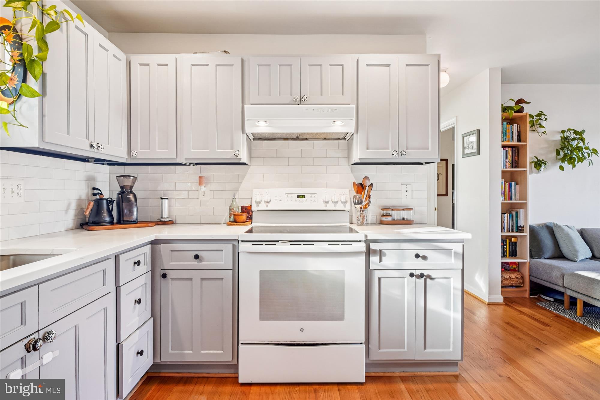 3064 Centre Road Riva, MD 21140 - Photo 13 of 45 a kitchen with cabinets appliances and wooden floor