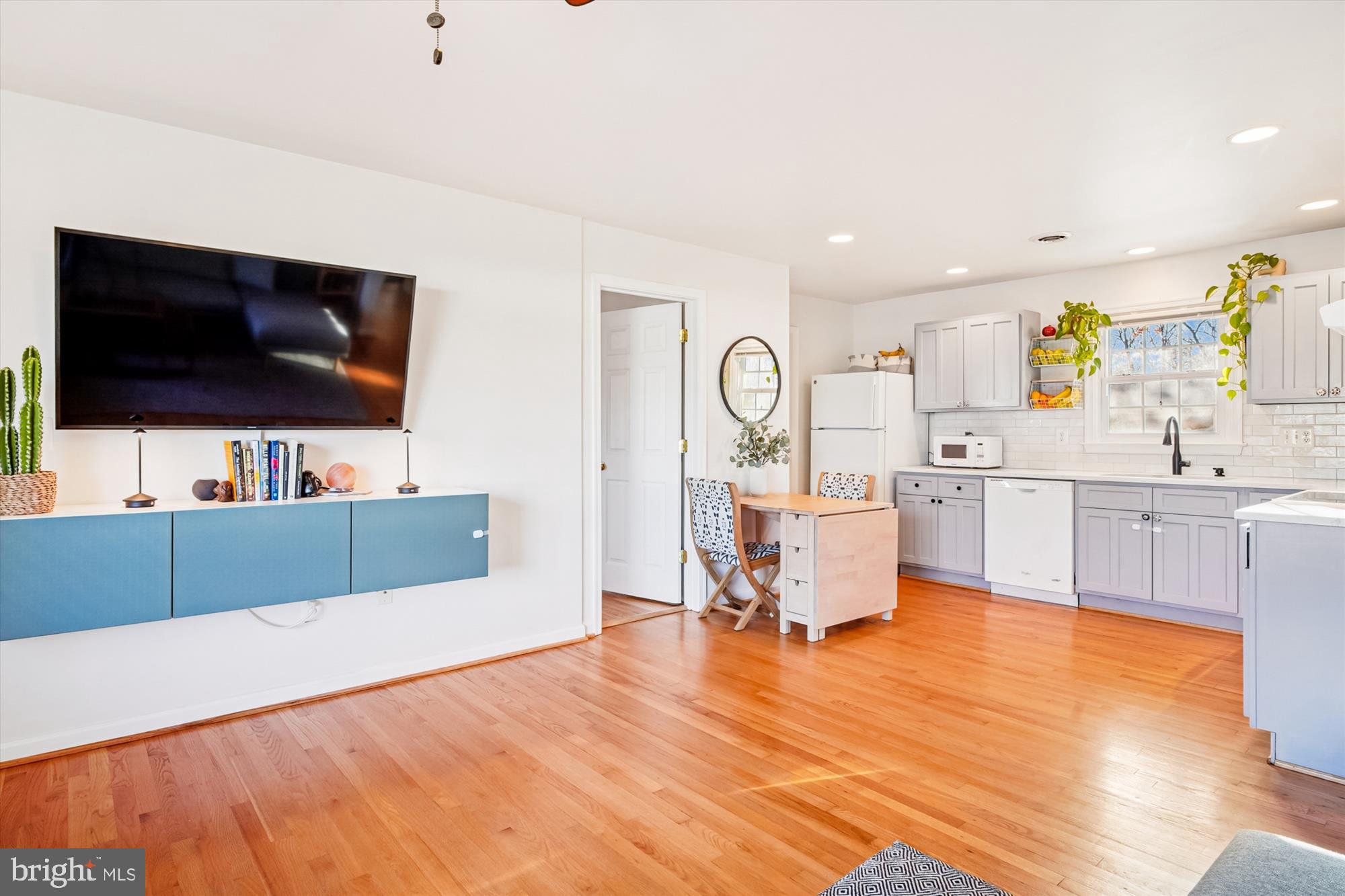 3064 Centre Road Riva, MD 21140 - Photo 15 of 45 a living room with furniture and a flat screen tv