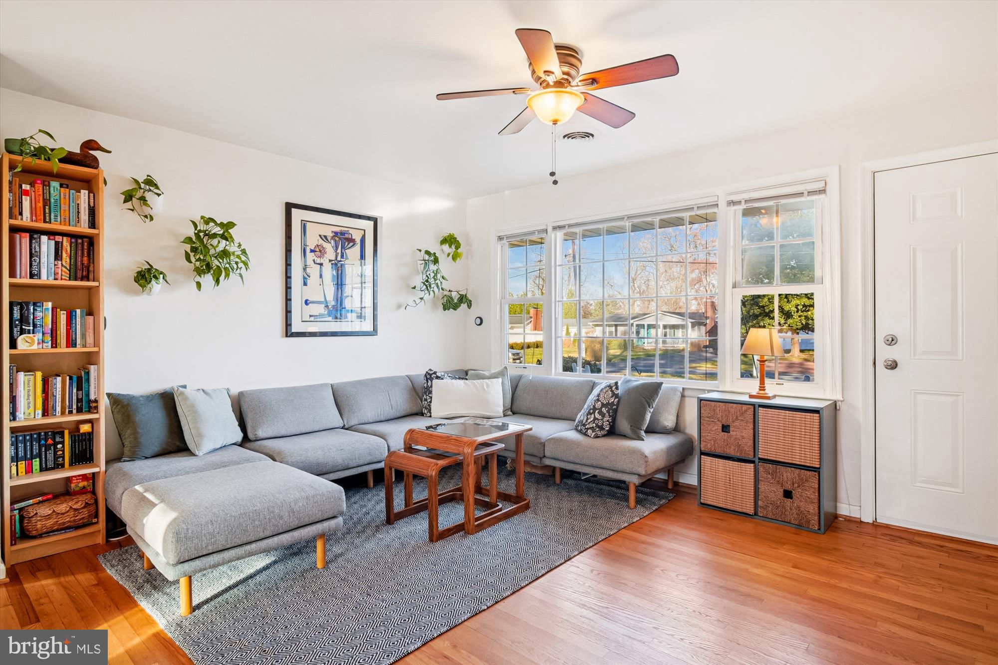 3064 Centre Road Riva, MD 21140 - Photo 8 of 45 a living room with furniture and a book shelf