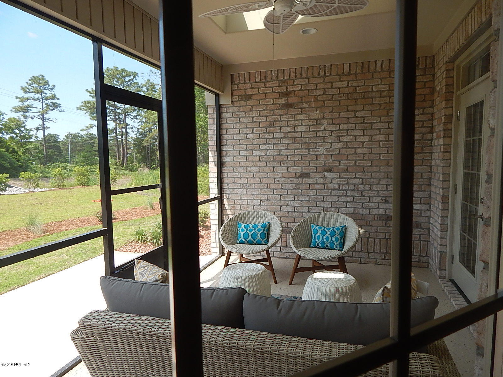 334 Motts Forest Road Wilmington, NC 28412 - Photo 17 of 27 Door to the lanai from the master bedroom