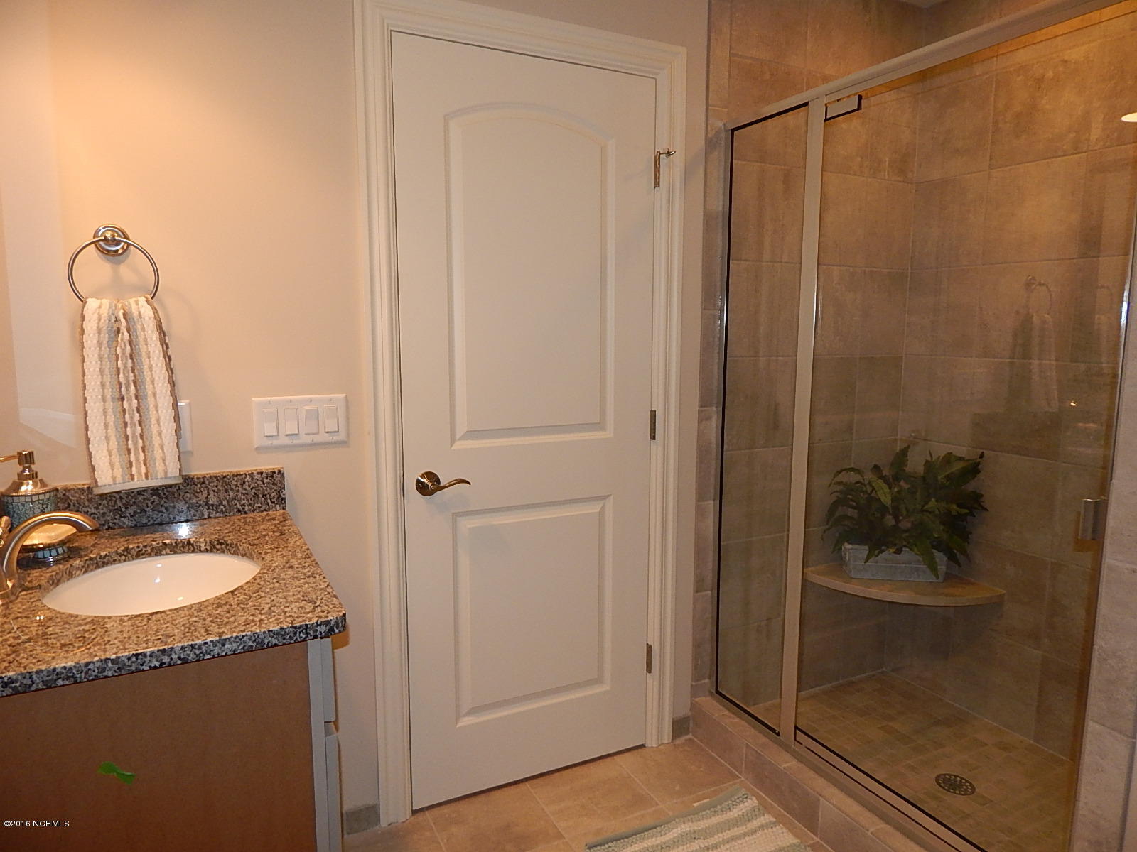 334 Motts Forest Road Wilmington, NC 28412 - Photo 25 of 27 Large bonus room private bath. Full ceramic shower, granite counter.