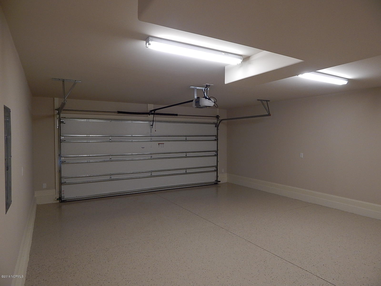334 Motts Forest Road Wilmington, NC 28412 - Photo 27 of 27 Epoxy painted finished floor and comes with an climate controlled storage closet.