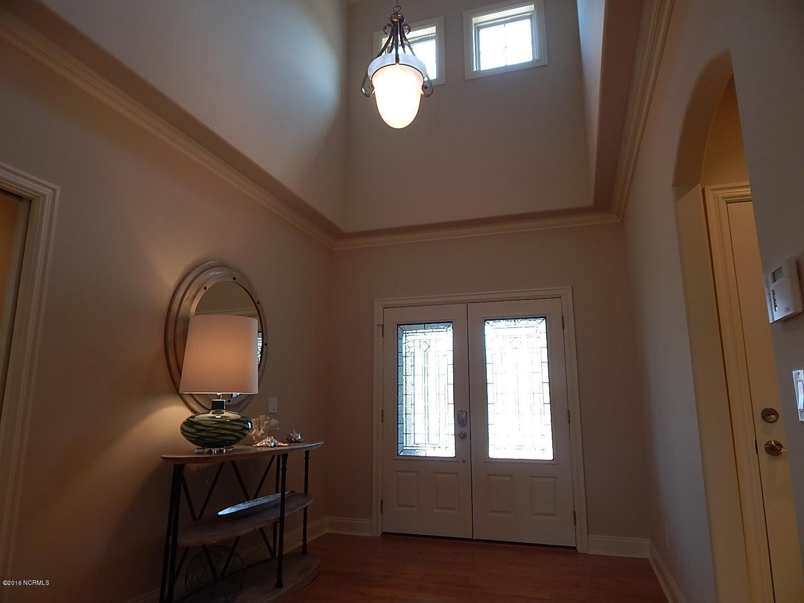 334 Motts Forest Road Wilmington, NC 28412 - Photo 4 of 27 Two story entry foyer with a double door entry.