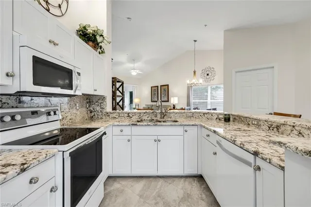 a dinning room and kitchen view