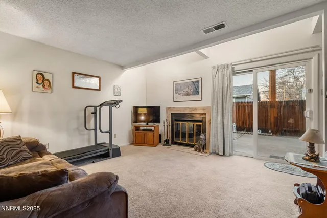 a view of livingroom with furniture and staircase