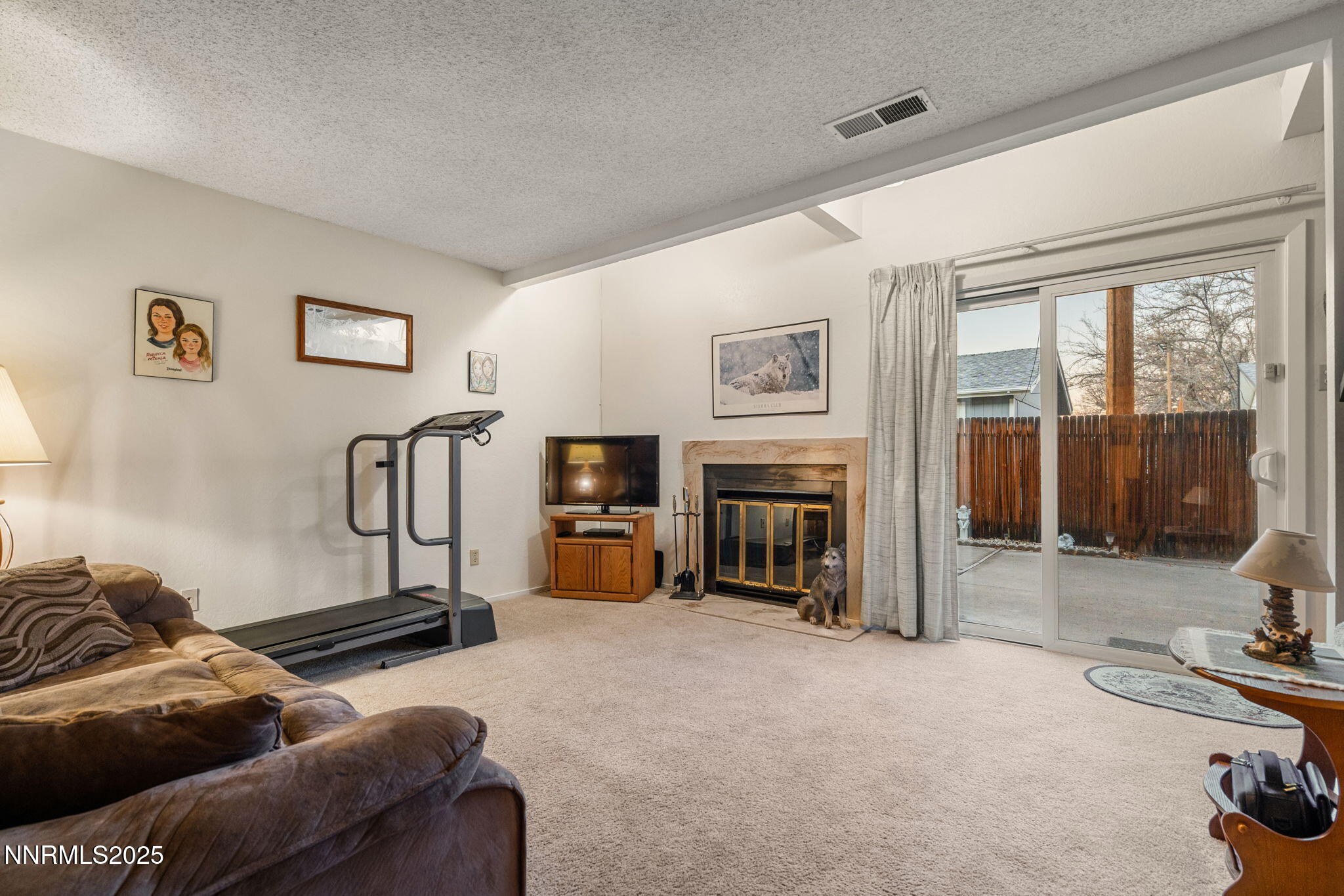 2282 Cannonball Road Sparks, NV 89431 - Photo 11 of 21 a living room with furniture and a flat screen tv