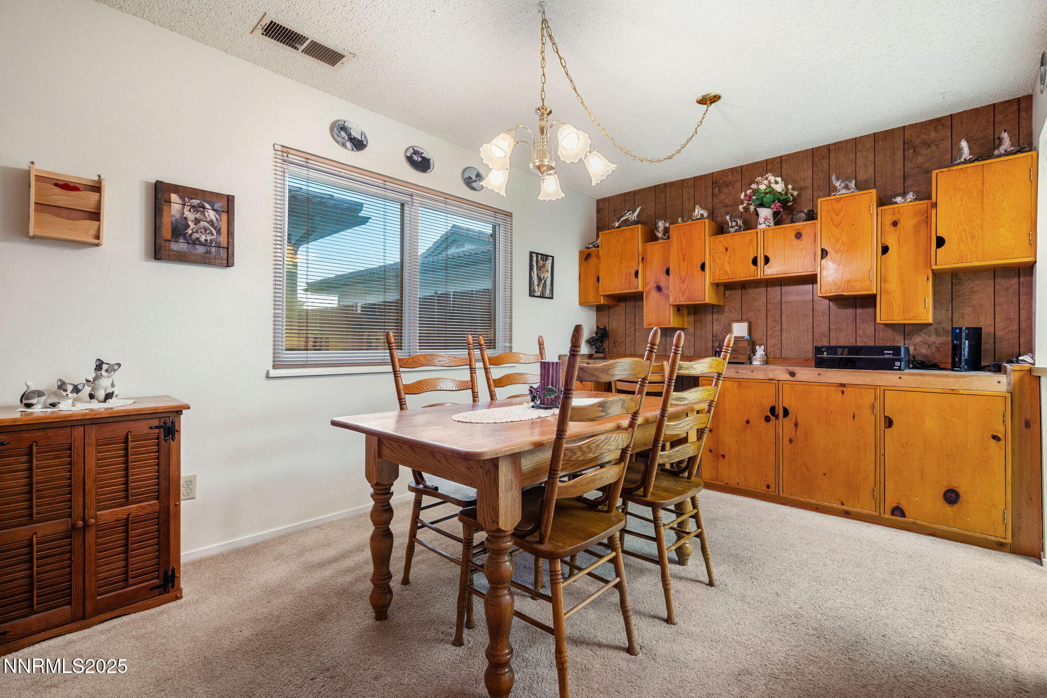 2282 Cannonball Road Sparks, NV 89431 - Photo 4 of 21 a dining area with a table chairs and a large window
