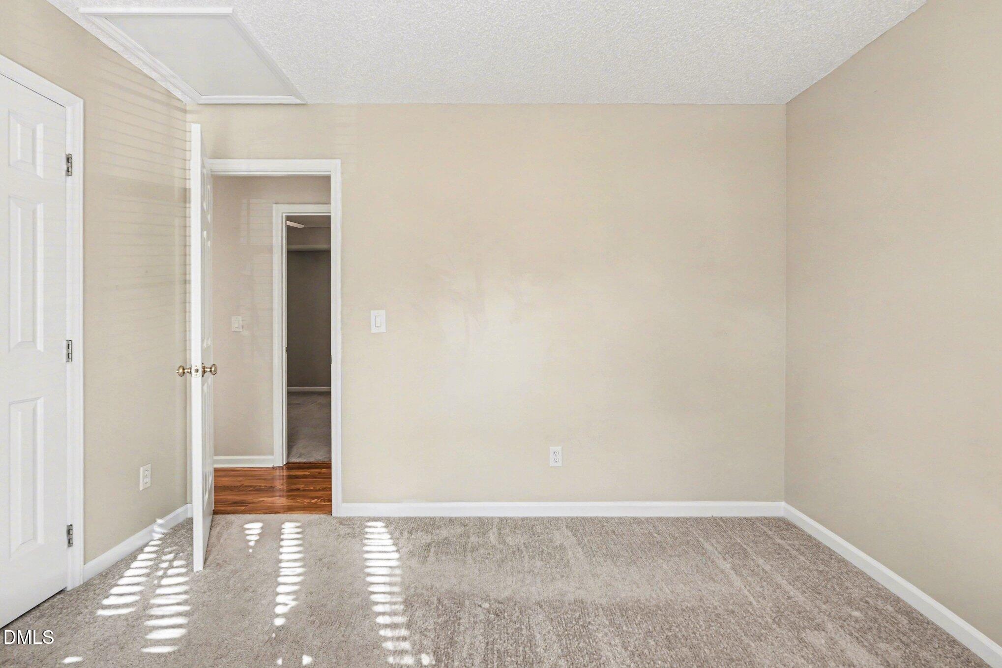 284 Dullis Circle Garner, NC 27529 - Photo 20 of 35 a view of an empty room