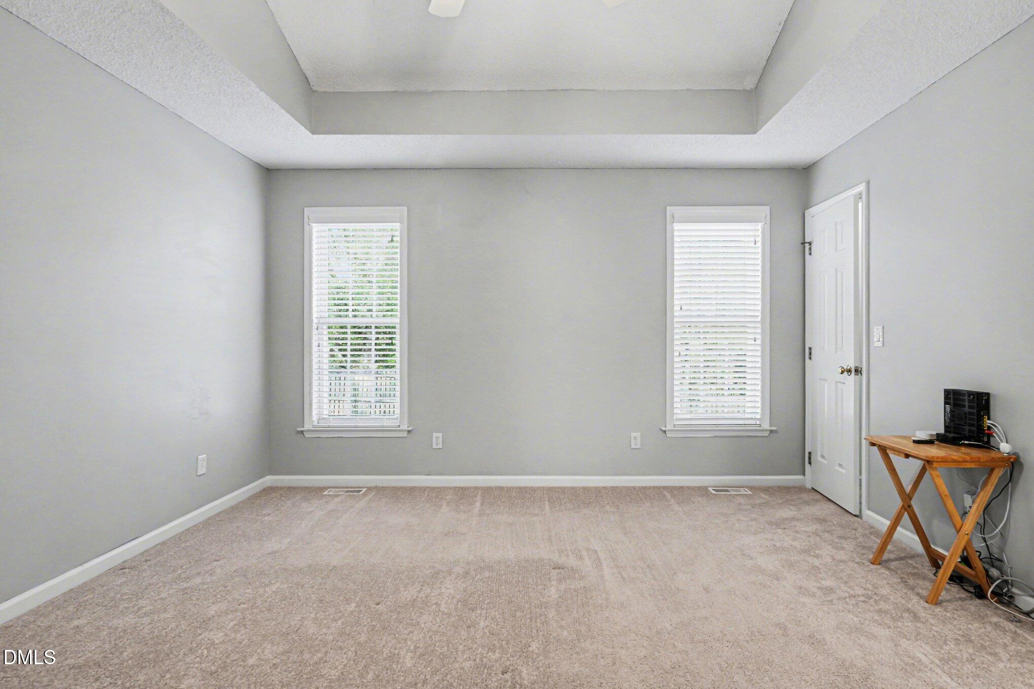 284 Dullis Circle Garner, NC 27529 - Photo 21 of 35 a view of livingroom with furniture and windows
