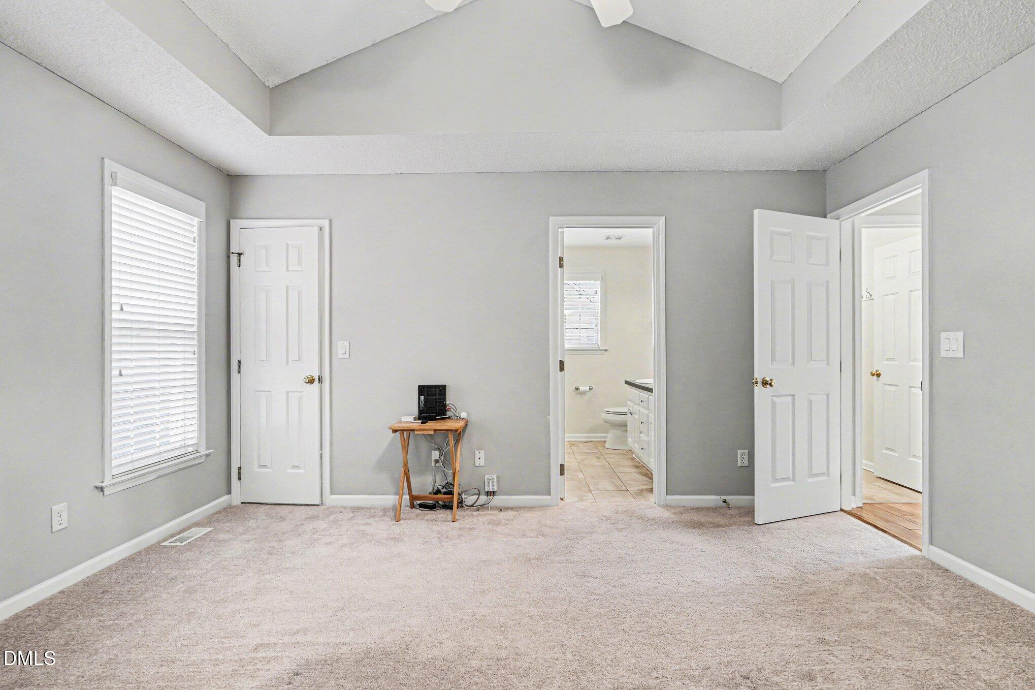 284 Dullis Circle Garner, NC 27529 - Photo 23 of 35 an empty room with windows and closet