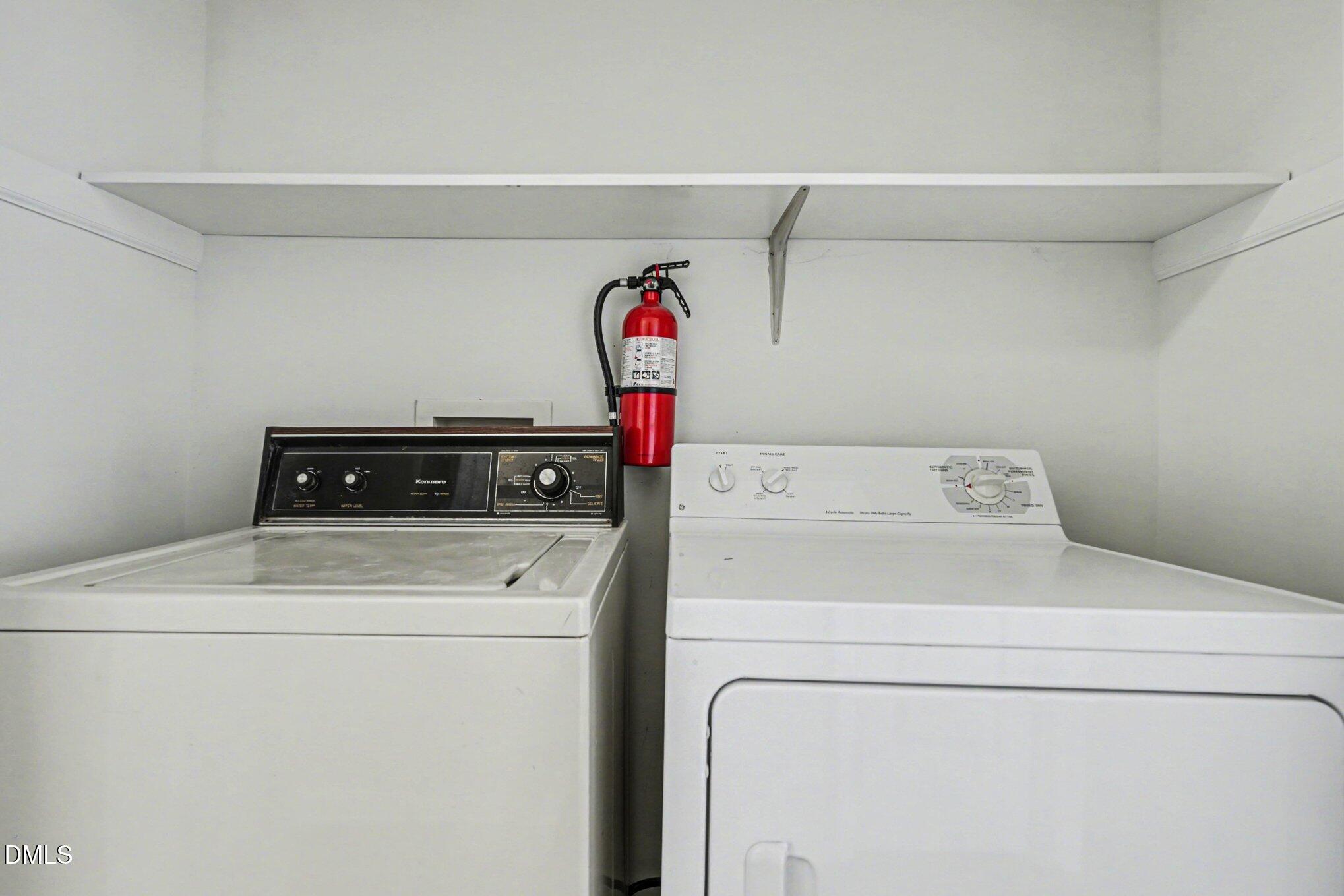 284 Dullis Circle Garner, NC 27529 - Photo 28 of 35 a utility room with dryer and washer