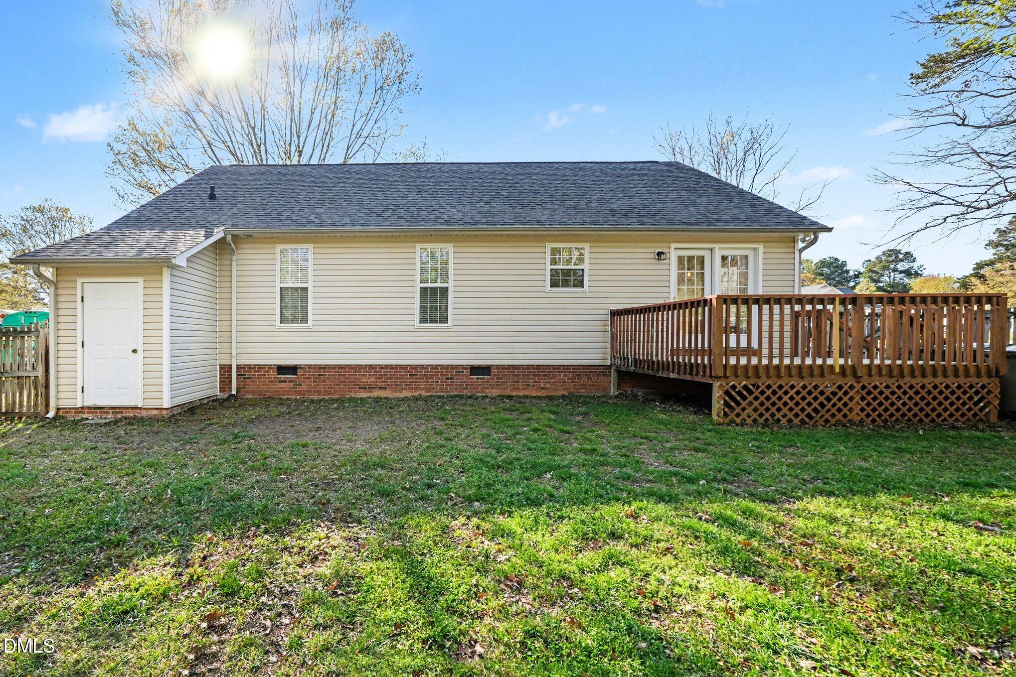 284 Dullis Circle Garner, NC 27529 - Photo 30 of 35 a view of backyard with wooden fence