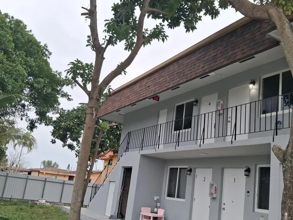 a front view of a house with balcony