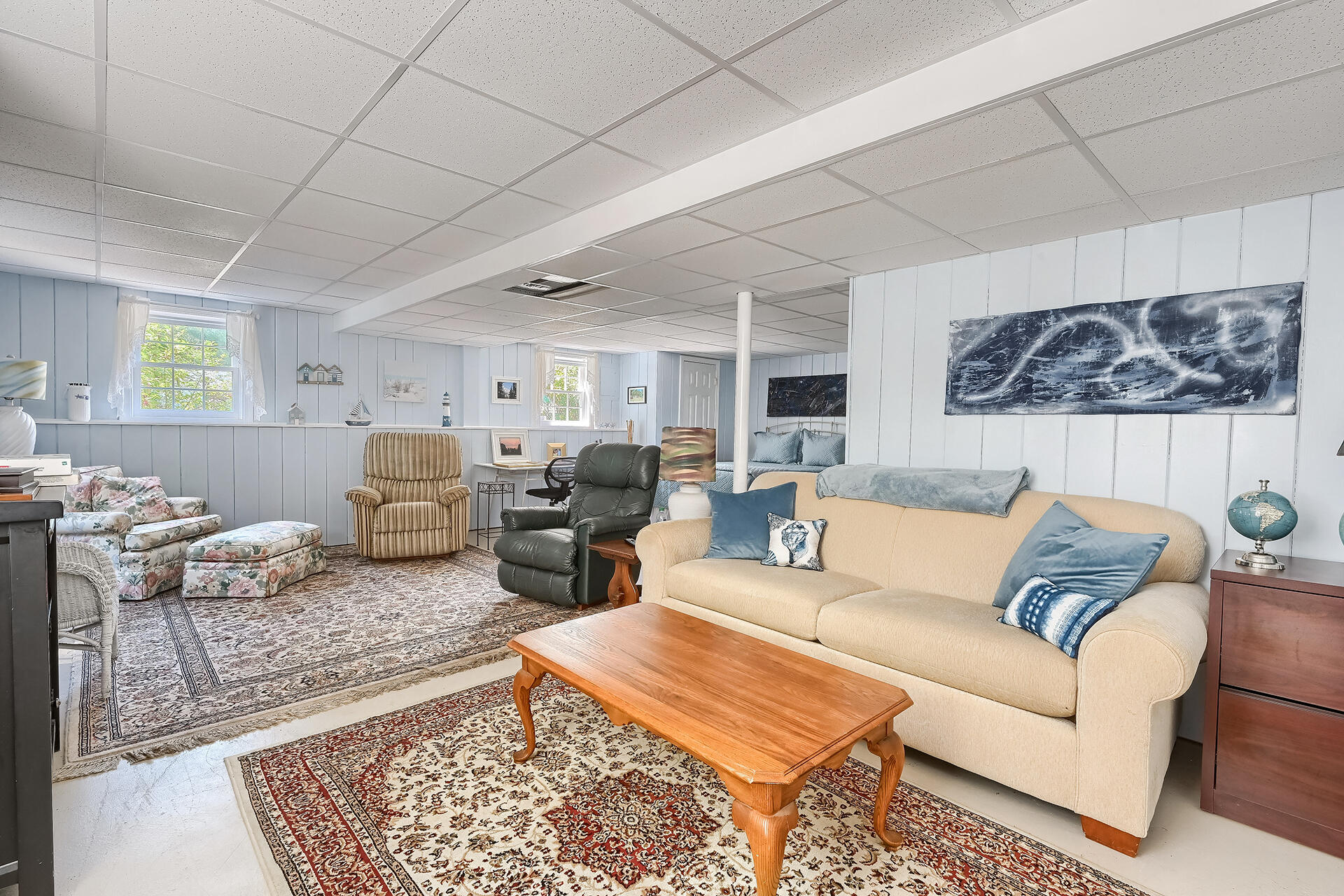 61 Merideth Way Centerville, MA 02632 - Photo 27 of 32 a living room with furniture lamp and rug