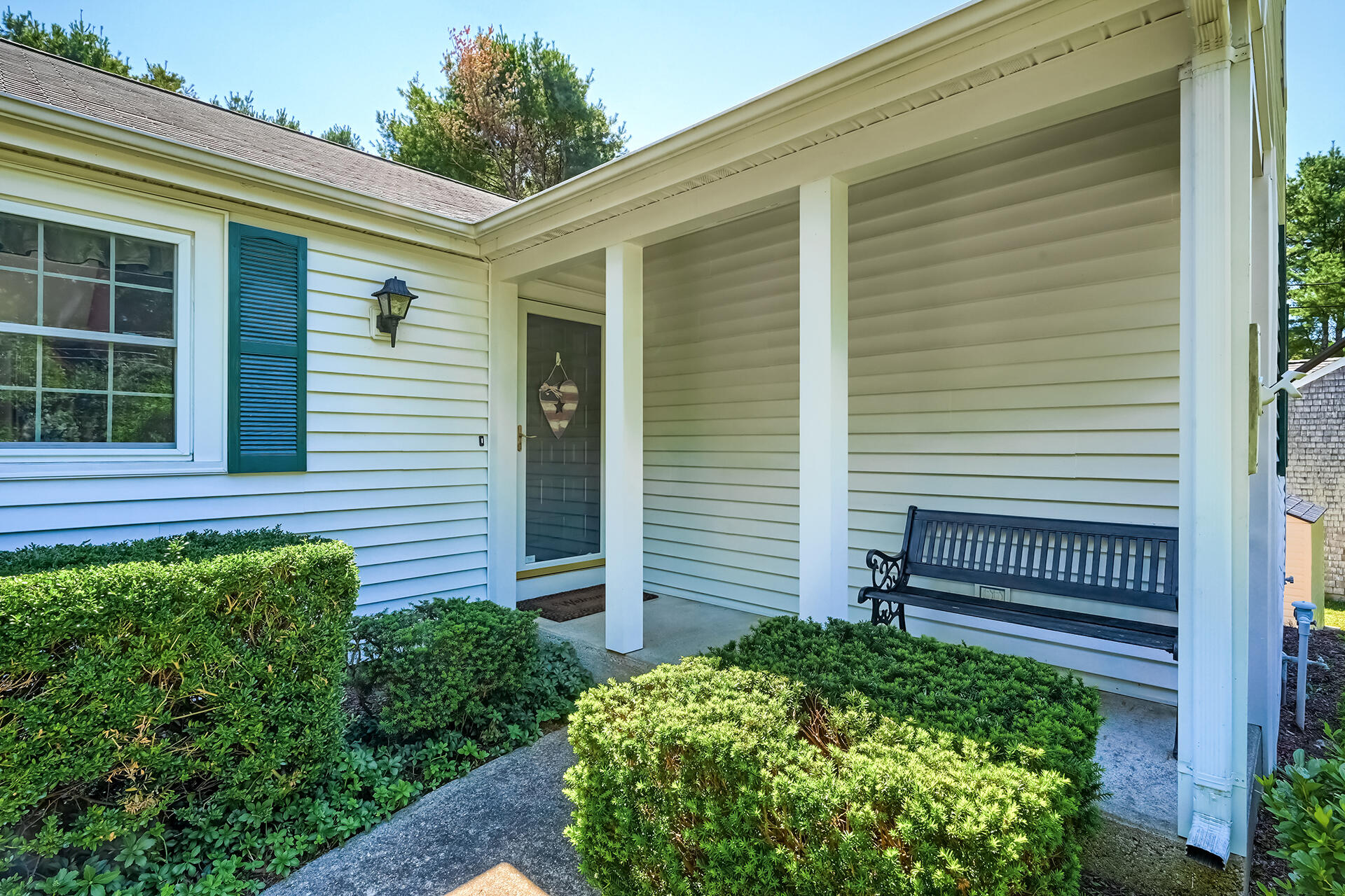 61 Merideth Way Centerville, MA 02632 - Photo 3 of 32 a view of a house with a yard and plants