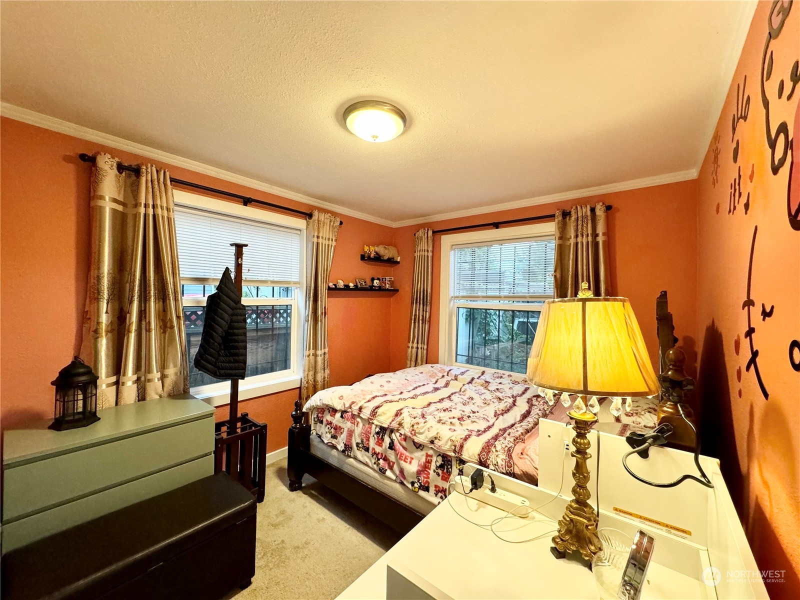 523 Main Avenue South Renton, WA 98057 - Photo 13 of 32 a bedroom with a bed and wooden floor