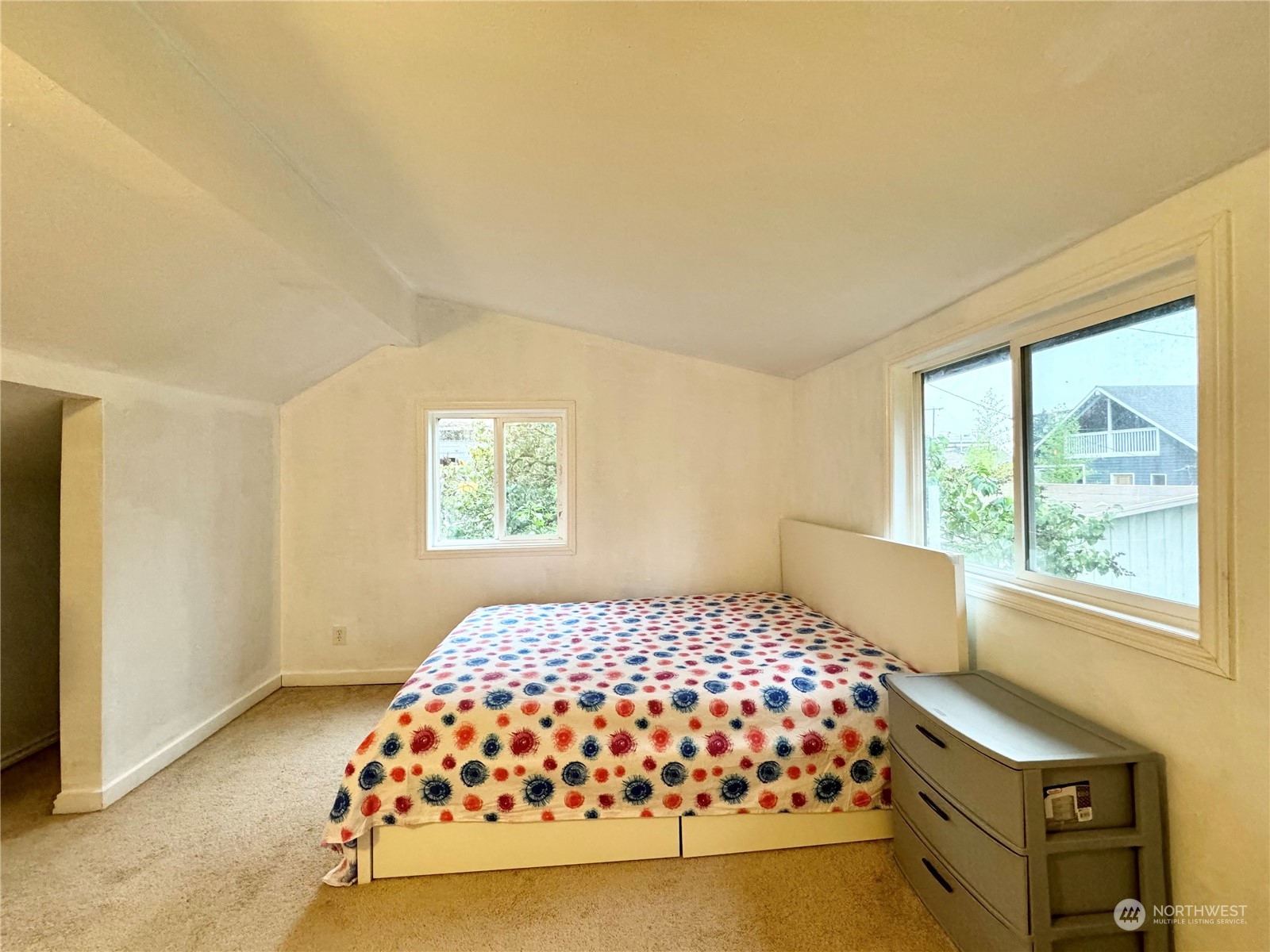 523 Main Avenue South Renton, WA 98057 - Photo 21 of 32 a bedroom with a bed and a window
