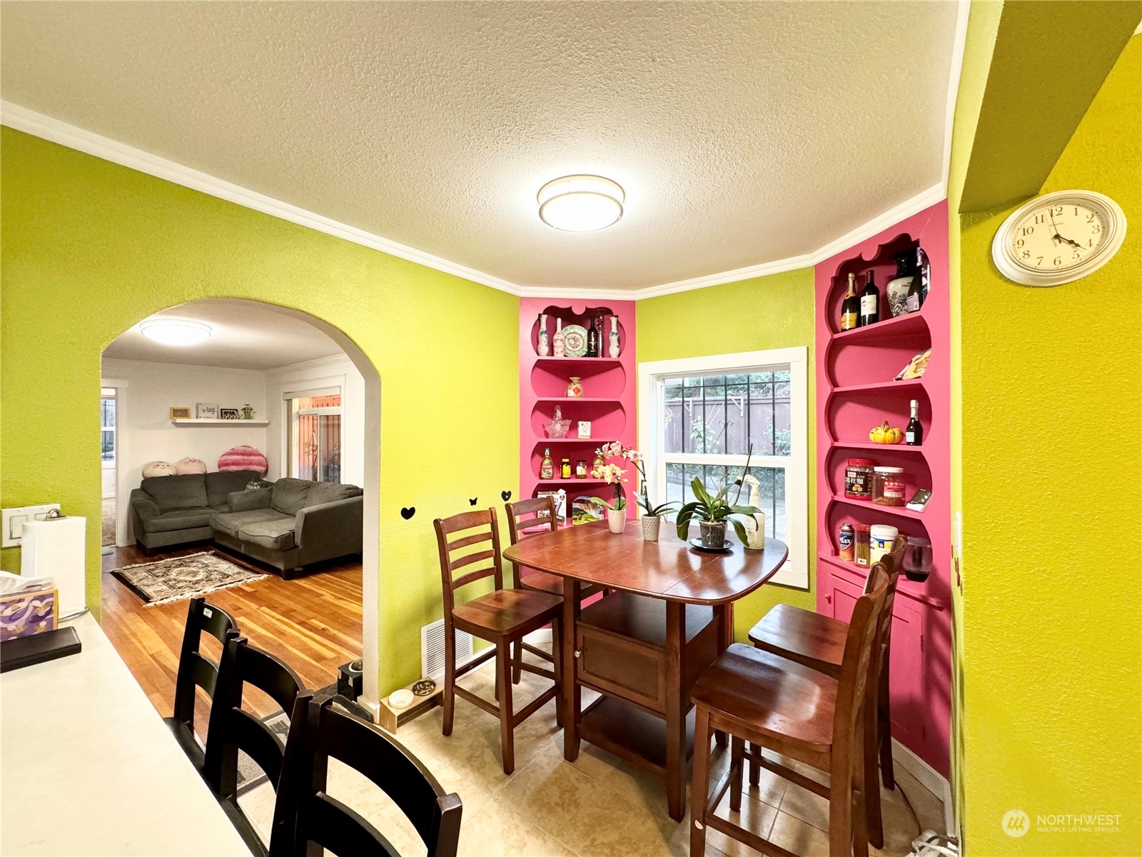 523 Main Avenue South Renton, WA 98057 - Photo 10 of 32 a view of a dining room with furniture and a window