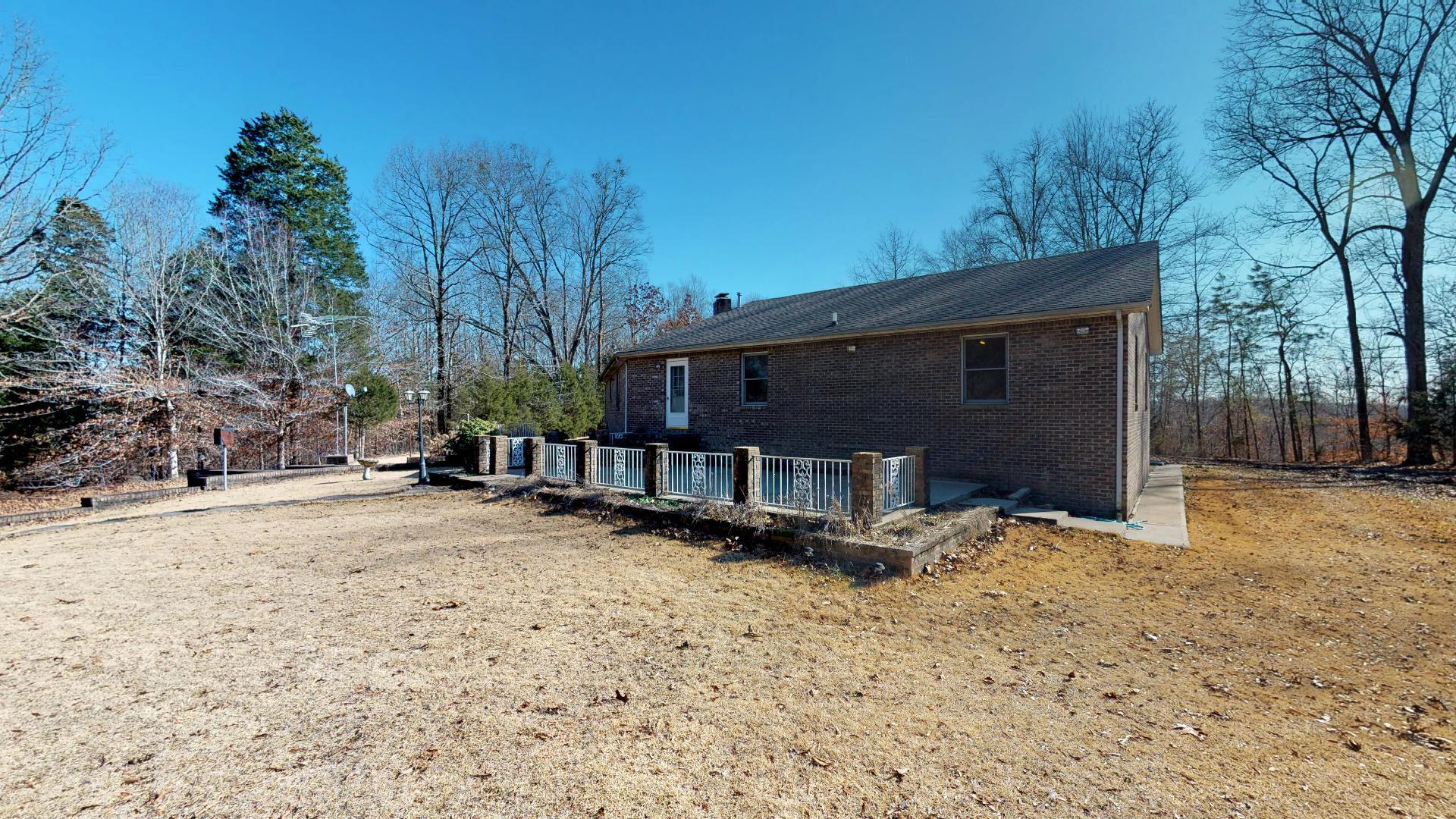 2609 Brigham Branch Road Erin, TN 37061 - Photo 17 of 22 Large Back patio, with large back yard