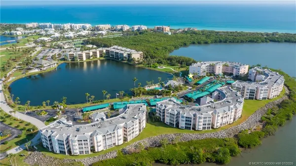 a view of a lake with a city