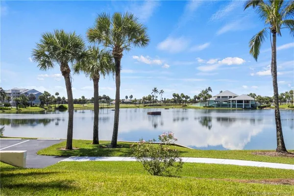 a view of living room with furniture and a window