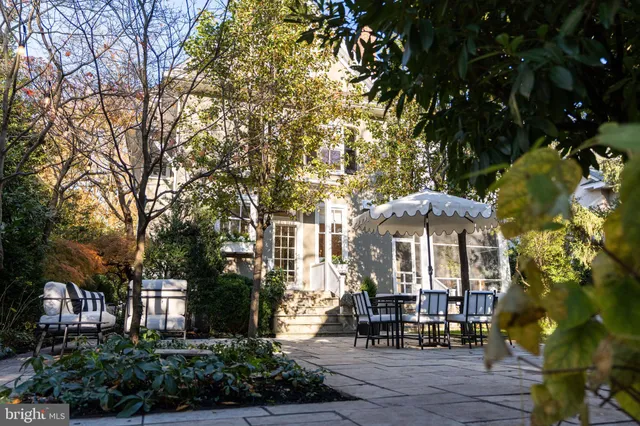 a bathroom with a sink and a washing machine